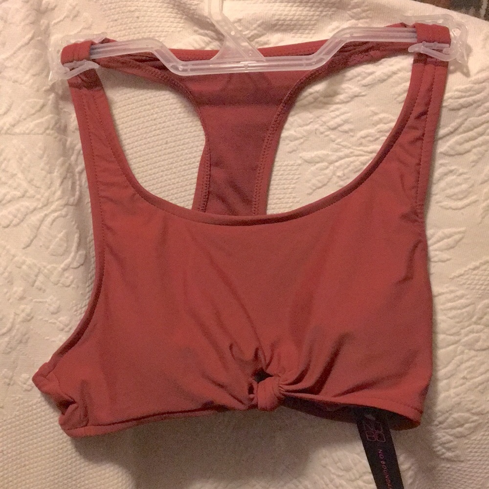 2 for $10 😃Burnt orange bikini bathing suit top. Racer back and front knot.